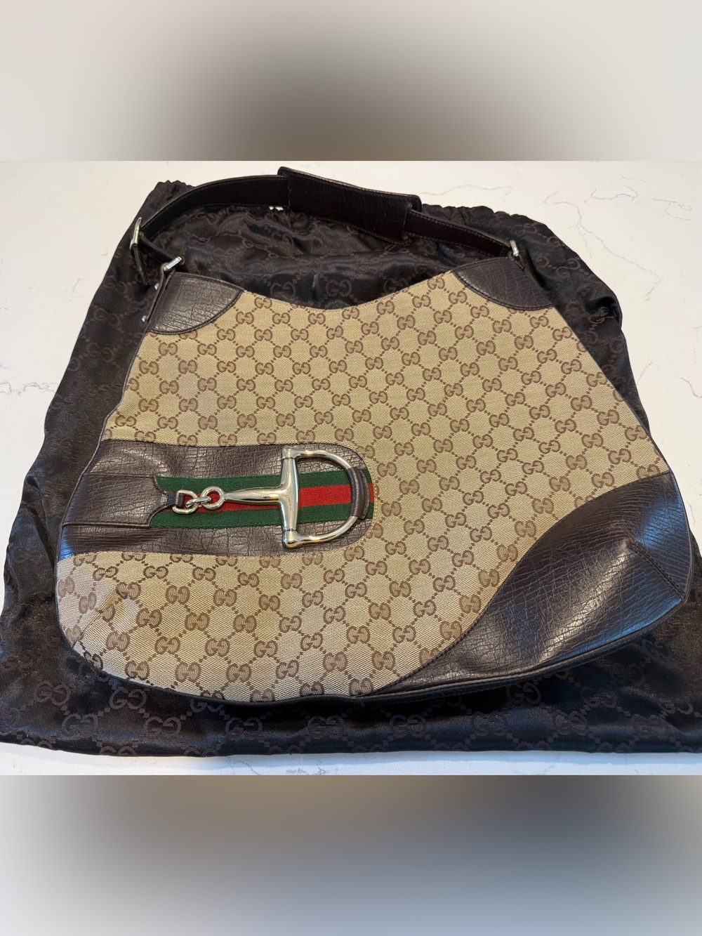 Gucci Monogram Hasler Hobo Bag in pristine shape.